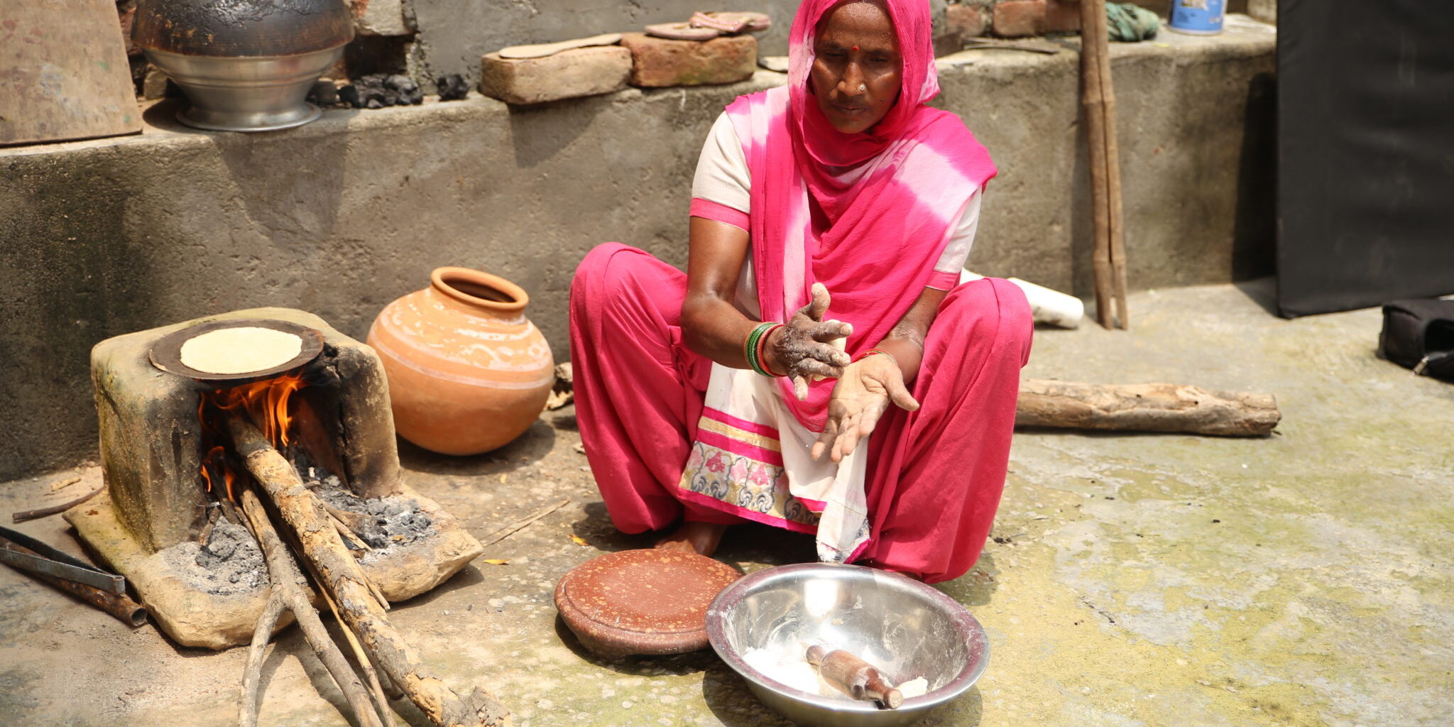 Lakshmi prepares food in her village in India